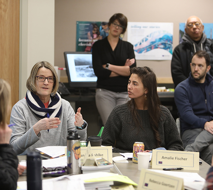 Educators discussing ideas together during a professional development session