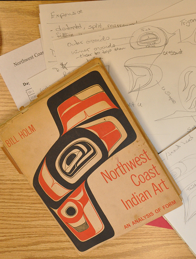 Northwest Coast Indian Art book beside formline design sketches
