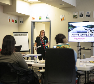 An educator gives a presentation during a professional learning session