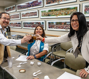 Judges taste seal oil together during the food contest