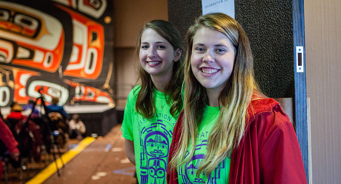 Two Celebration volunteers smiling inside the Walter Soboleff Building