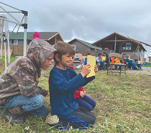 Students seated together during a Voices on the Land gathering