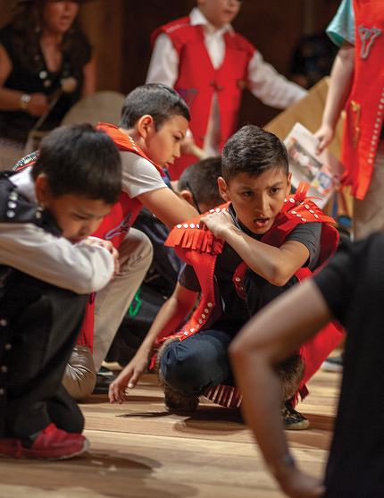 TCLL students performing a traditional dance