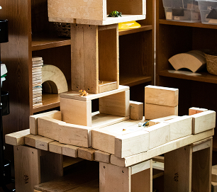 A student-built structure made from wooden blocks