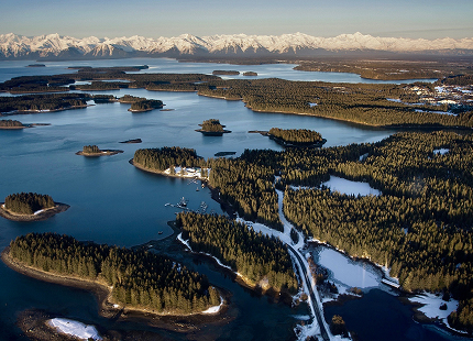 Aerial view of forested islands and waterways in Southeast Alaska