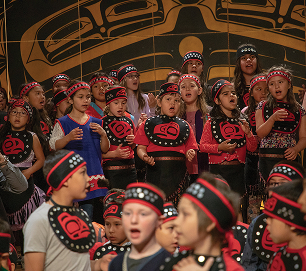 TCLL students singing together during a group performance