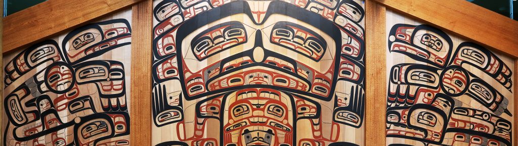 Carved and painted Tsimshian clan house front by David A. Boxley