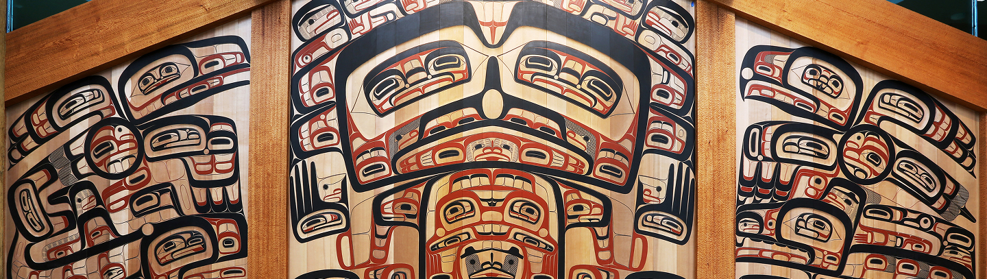 Carved and painted Tsimshian clan house front by David A. Boxley