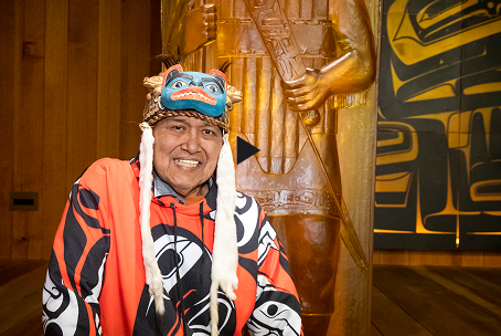 Koowuṯa̱s.ein Daniel Brown wearing Northwest Coast regalia in the clan house