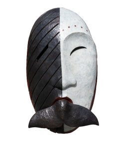 Iñupiat mask with a black and white face and a whale’s tail