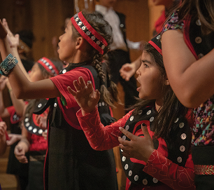 TCLL students performing in traditional regalia